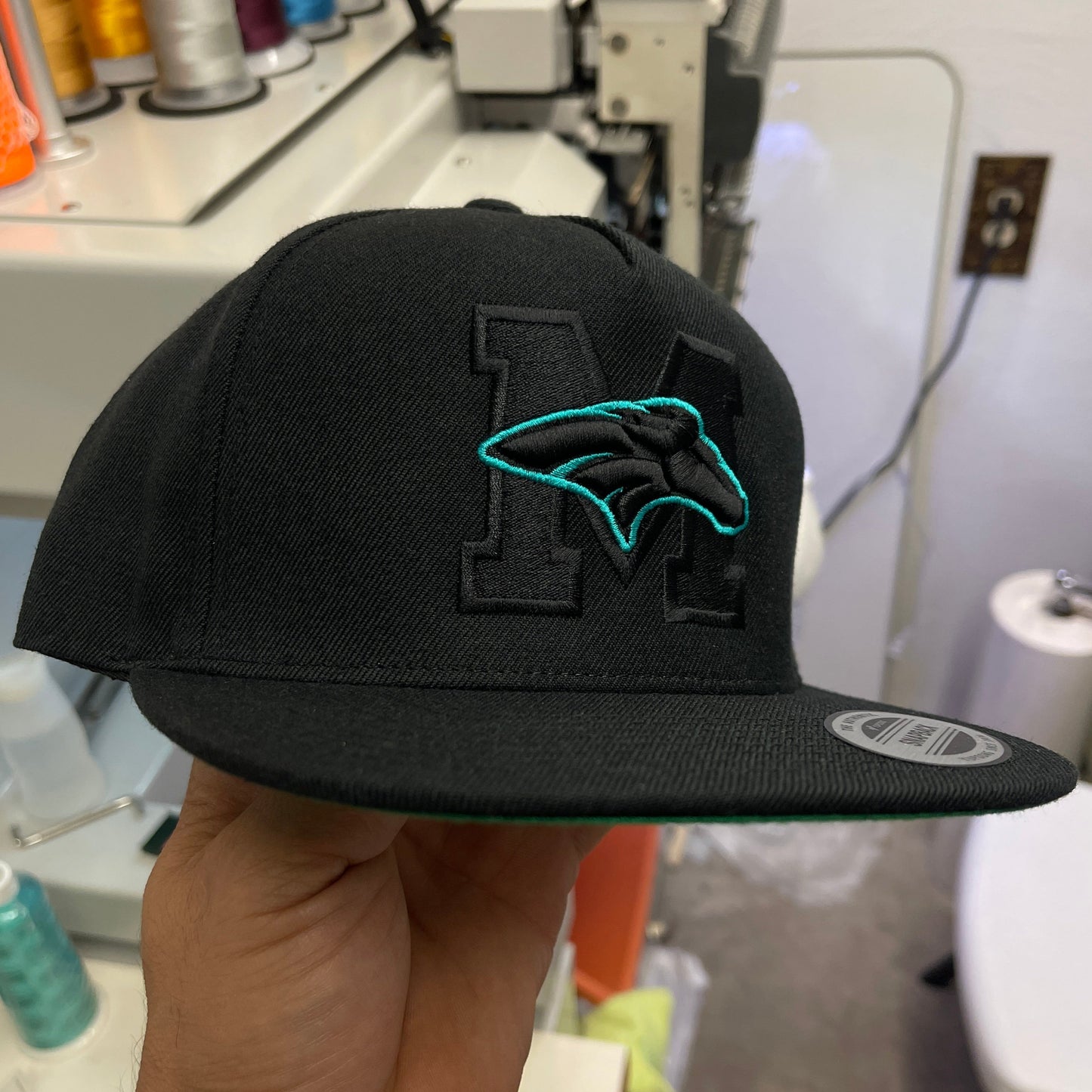 All Black Pasadena Memorial Mavericks Snapback Flat Bill Cap